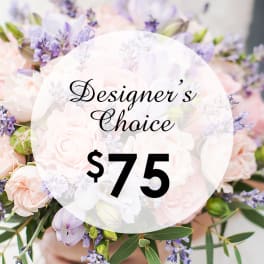 Pastel bouquet of pink roses and lavender flowers with a $75 designer's choice label