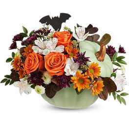 Pumpkin-shaped arrangement with orange roses and autumn flowers