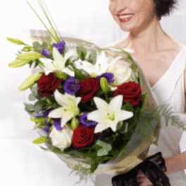 Bouquet of red roses and white lilies with purple accents