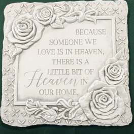Decorative memorial plaque with raised roses and a sympathy quote
