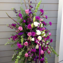 Tall floral spray with pink, white, and purple flowers