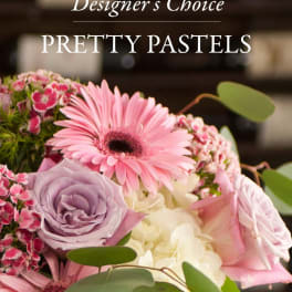 Pastel bouquet with pink gerbera daisies, lavender roses, and white hydrangea
