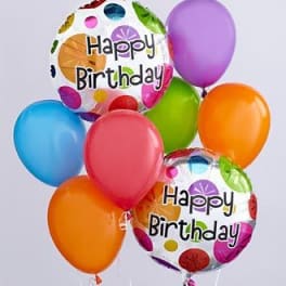 Birthday balloons in bright colors, including two "Happy Birthday" balloons