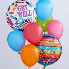 Cluster of colorful balloons, including two printed get-well balloons