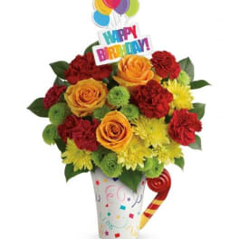 Birthday bouquet in a decorated cup with balloons and a topper