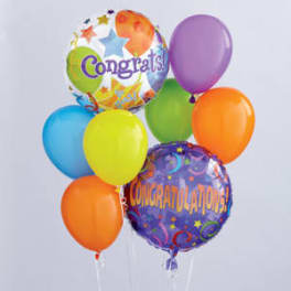Cluster of colorful congratulatory balloons with two printed foil balloons