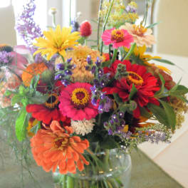 Colorful mixed bouquet in a clear glass vase
