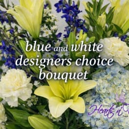 Blue and white bouquet with lilies, hydrangeas, carnations, and small daisies