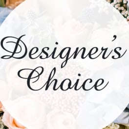 Round sign reading "Designer’s Choice" over a floral background
