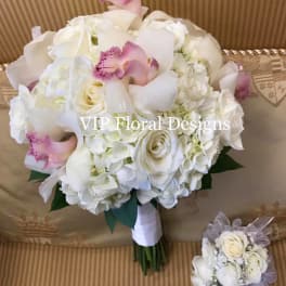 White bridal bouquet with pink orchid accents and a matching mini bouquet
