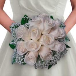 Bridal bouquet of pale roses with baby's breath