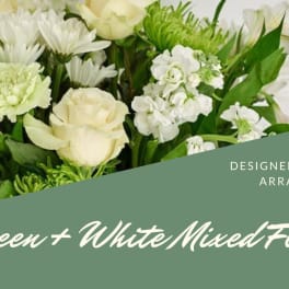 White and green mixed flower arrangement with roses and daisies