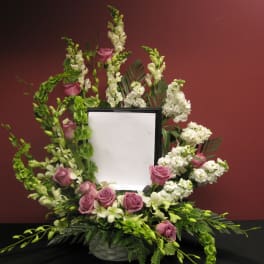Floral wreath around a framed blank center with pink roses and white blooms