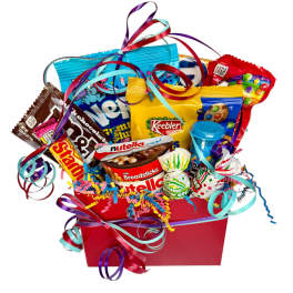 Bright red gift box filled with assorted candy packages and colorful curling ribbons.