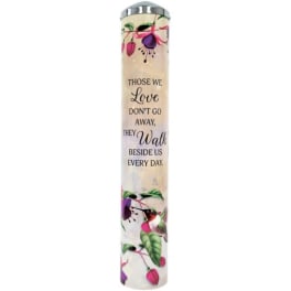 Memorial candle with floral design and sympathy message