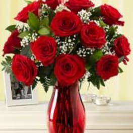 Red rose, Baby breathe and greens in a red vase