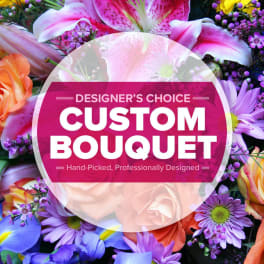 Colorful bouquet with lilies, roses, and purple daisies