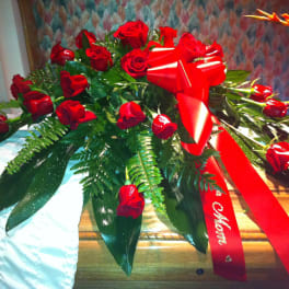 Bouquet of red roses with a red ribbon