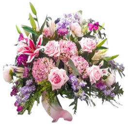 Pink and purple mixed flower arrangement in a vase