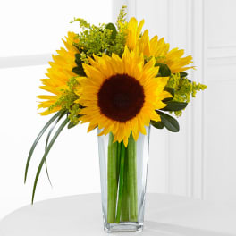 Sunflower bouquet in a clear glass vase