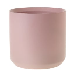 Pink cylindrical vase or container on a white background