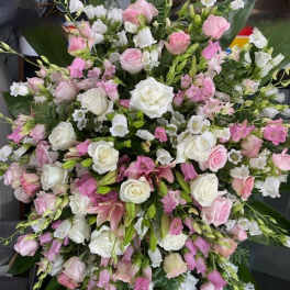 Large pink and white floral spray with roses and lilies