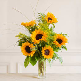 Sunflower bouquet in a clear glass vase