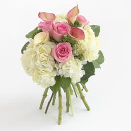 Bouquet of pink roses, white hydrangeas, and calla lilies