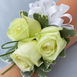 White rose wrist corsage with ribbon bow