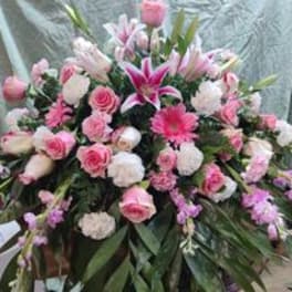 Large pink and white floral spray with lilies and roses