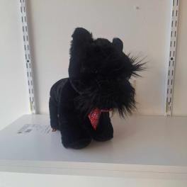 Black plush cat figurine with a red bandana