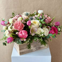 Pink and white mixed bouquet in a wooden box