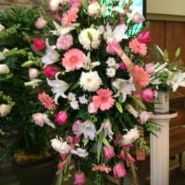 Large standing floral spray with pink and white flowers