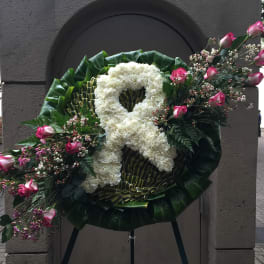 Roses and Carnation with Ti leaf surround wreath - F35009