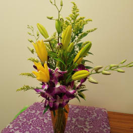 Purple orchids and Yellow Lilies