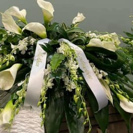 White Orchid and Calla Casket spray