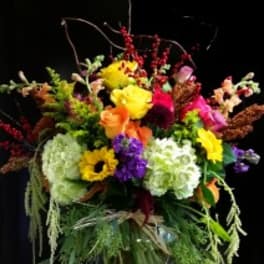 Colorful mixed bouquet in a clear glass vase