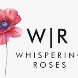 Pink flower beside the words Whispering Roses