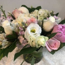 Pink and white mixed bouquet in a glass vase