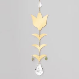 Hanging gold and silver decorative mobile with leaf-shaped pieces
