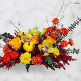 Bright mixed floral arrangement with yellow, orange, and red blooms