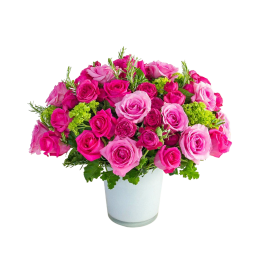 Pink and magenta roses arranged in a white vase