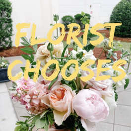 Pink and peach bouquet with roses and peonies