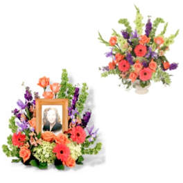 Floral photo tribute with a framed portrait and a matching vase arrangement