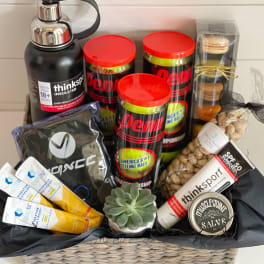 Gift basket with sports bottles, snacks, and a small succulent