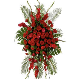 Tall red rose standing spray on an easel with palm fronds