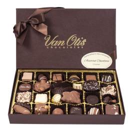 Box of assorted chocolates in a brown gift box with a ribbon