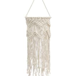 Cream macramé wall hanging with long fringe