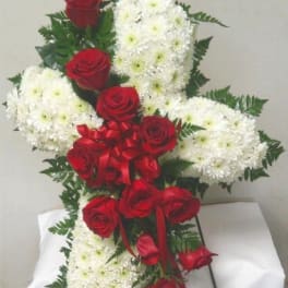Red roses and white chrysanthemums arranged on a standing spray