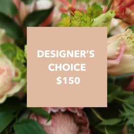 Designer’s choice floral arrangement with pink and cream blooms